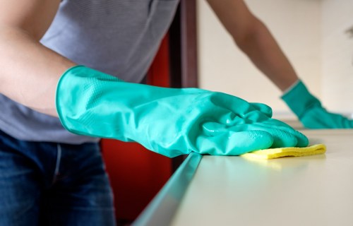 Local communal area cleaning team working in a BR1 apartment block